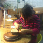 Children at work on our family workshops in jewellery making
